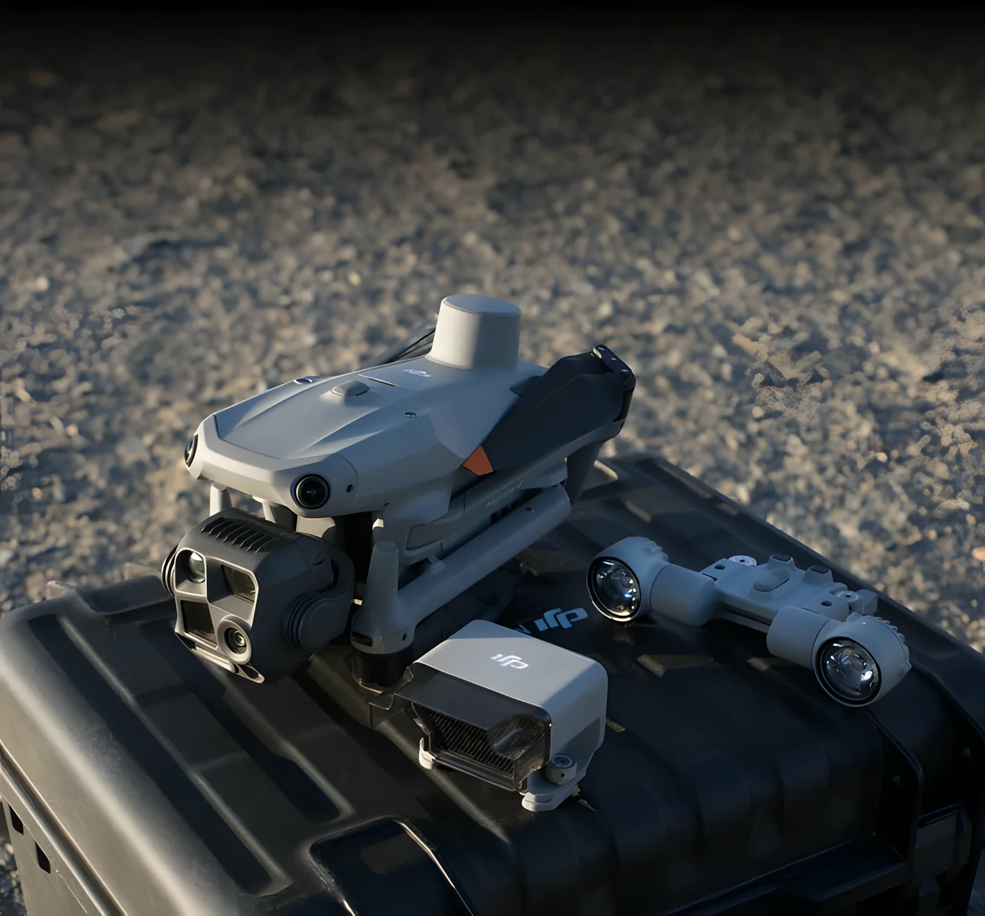 Field deployment: the aircraft folded on its transport case, with batteries and sensor heads.